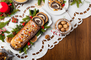 Poppy seed roulade in Christmas decoration. Served with coffee or tea.