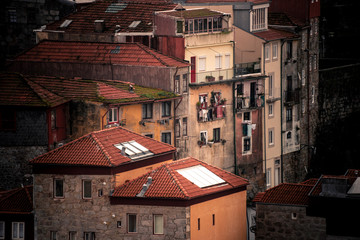 Fototapeta na wymiar Houses with roofs in Porto