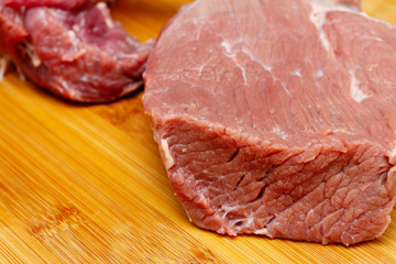 Cooking a delicious, juicy steak at home. Сutting beef meat