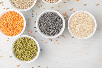 Various legumes in small bowls