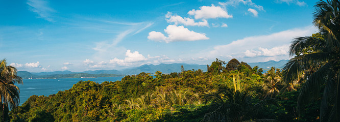 Tropical island panorama with rainforest and blue sea in Myanmar