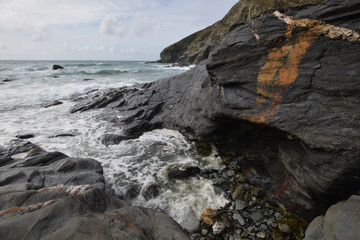 Obraz premium Incoming tide Tregardock Beach Cornwall England
