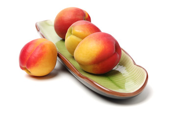 Fresh cut apricot fruits isolated on white background, with clipping path