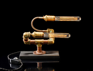 lamp in the style of steampunk isolated on a black background