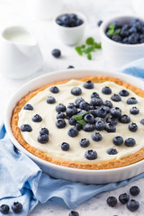 Blueberry tart with whipped cream 