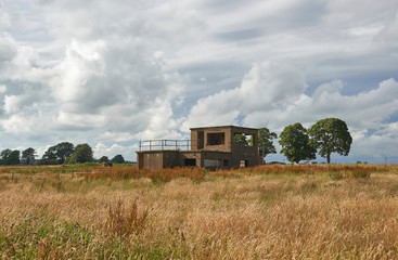 The derelict ruins of the Control Tower at the old RAF Kinnell Satellite Airfield which No 56 Operational Training Unit used during the War.