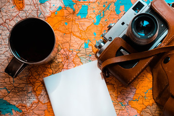 abstract background with world map and old camera