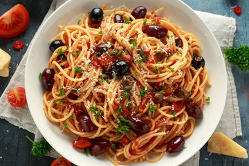 Pasta Alla Puttanesca with garlic, olives, capers, tomato and anchois fish