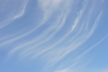 White long puffy and soft clouds in the blue sky