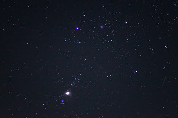 Obraz premium Underexposed night sky low light photo. A lot of stars and constellations on dark sky. Stock photo of deep sky.