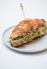 sandwich of goukomole on a white background