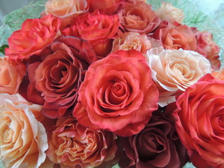 Roses of different colors in the bouquet.a festive bouquet of twenty-one flowers.
