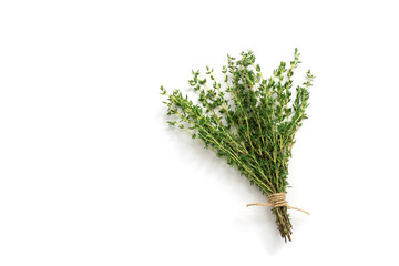 Fresh thyme herb on white background. Bouquet of thyme isolated. View from above.
