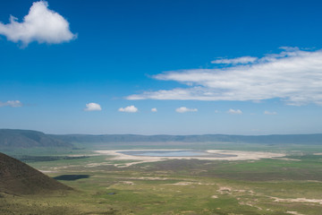 Scenery above view of Ngorongoro crater with deep blue sky © ilyaska