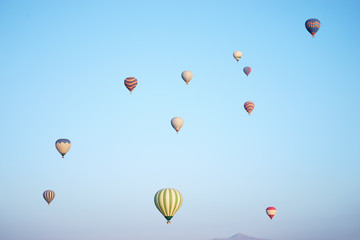 Aerostatics and aeronautics. Airbaloons against blue sky.