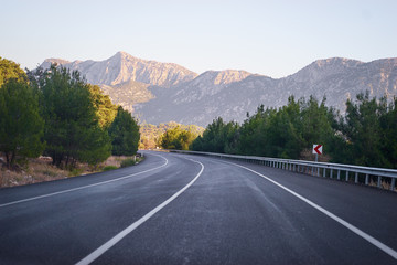 Open road! Landscape with empty road and mountains.