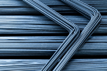 Top view. Many small iron wire curved and straight with dark gray. In the steel industry.