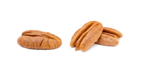 Fresh pecan nuts isolated on a white background