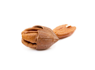 Fresh pecan nuts isolated on a white background