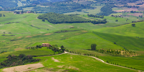 PIENZA, ITALY - MAY 12, 2014: Beautiful typical countryside summer landscape, Tuscany