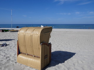 Nest with breeding seagull on a beach chair at Sehlendorfer Strand, Hohwachter Bucht.  Blekendorf, Schleswig-Holstein, Germany, Europe