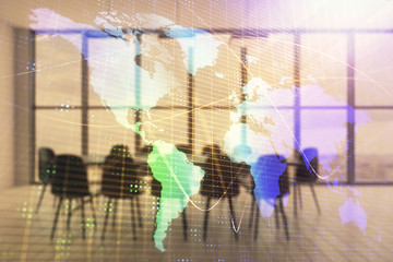 Double exposure of globe hologram on conference room background. Concept of international business