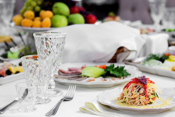 Delicious dishes on the table in the restaurant. Wedding, Banquet