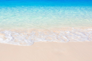 Fototapeta na wymiar Pure white sand beach and turquoise seawater in summer.