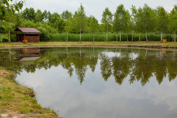 Obraz premium Holiday house near the lake. The concept of fishing and recreation