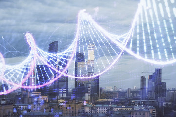 Multi exposure of DNA hologram on cityscape background. Concept of education