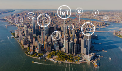 IoT theme with aerial view of Manhattan, NY skyline
