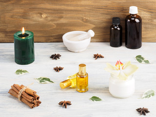 Still life from natural aromatherapy ingredients on a white wooden background