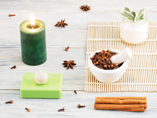 Obraz na płótnie Canvas Natural aromatherapy ingredients on a white wooden background