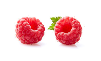 Two raspberry in closeup on white