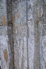 Metal fence covered in paper and glue with interesting texture