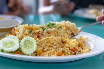Close up of fried rice with crab with vegetable (Selective focus)