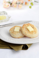 Fototapeta na wymiar english crumpets with butter