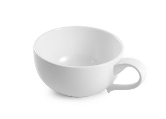 white ceramic cup on white background
