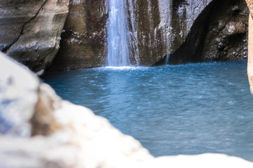 Fototapeta na wymiar water flowing over rocks