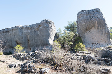 Natural place formed by vegetation and rocks with shapes caused by erosion