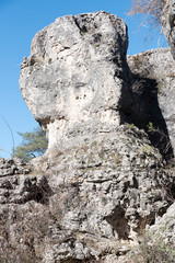 Natural place formed by vegetation and rocks with shapes caused by erosion