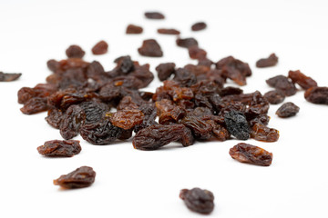  Dried raisins isolated on a white background.