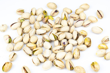 Pistachio nuts isolated on a white background.