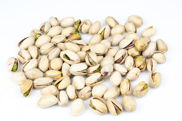 Pistachio nuts isolated on a white background.