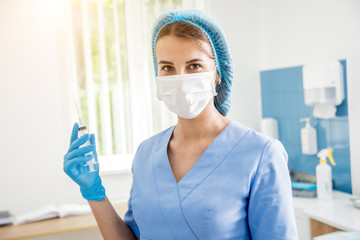 Nurse taking blood sample. Medical equipment.