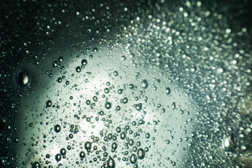 colorful bubbles on transparent liquid