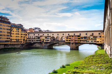 Ponte Vecchio a medieval stone closed-spandrel segmental arch bridge over the Arno River in Florence