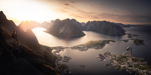 a person watching sunset in the mountains in Norway