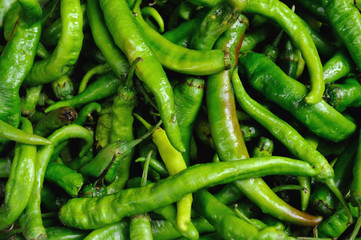 Full Frame Shot Of Green Peppers. Background texture of hot green pepper. Red chili, seasoning paprika.