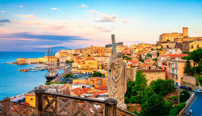 Panoramic view of Gaeta from Monte Orlando, Lazio, Italy. Cityscape of Gaeta town and statue of Saint Francesco. Architecture and landmark of Gaeta, Italy. Famous places of Gaeta and Italy - obrazy, fototapety, plakaty